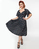Unique Vintage Curve 1950s Black Tulip Pin Dot Swing Dress - thumbnail