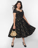 Unique Vintage Black & Gold Moon & Stars Midge Swing Dress - thumbnail