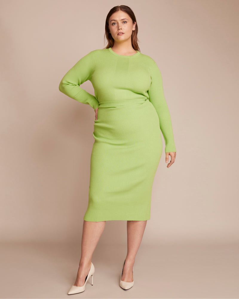 plus size woman in workwear outfit