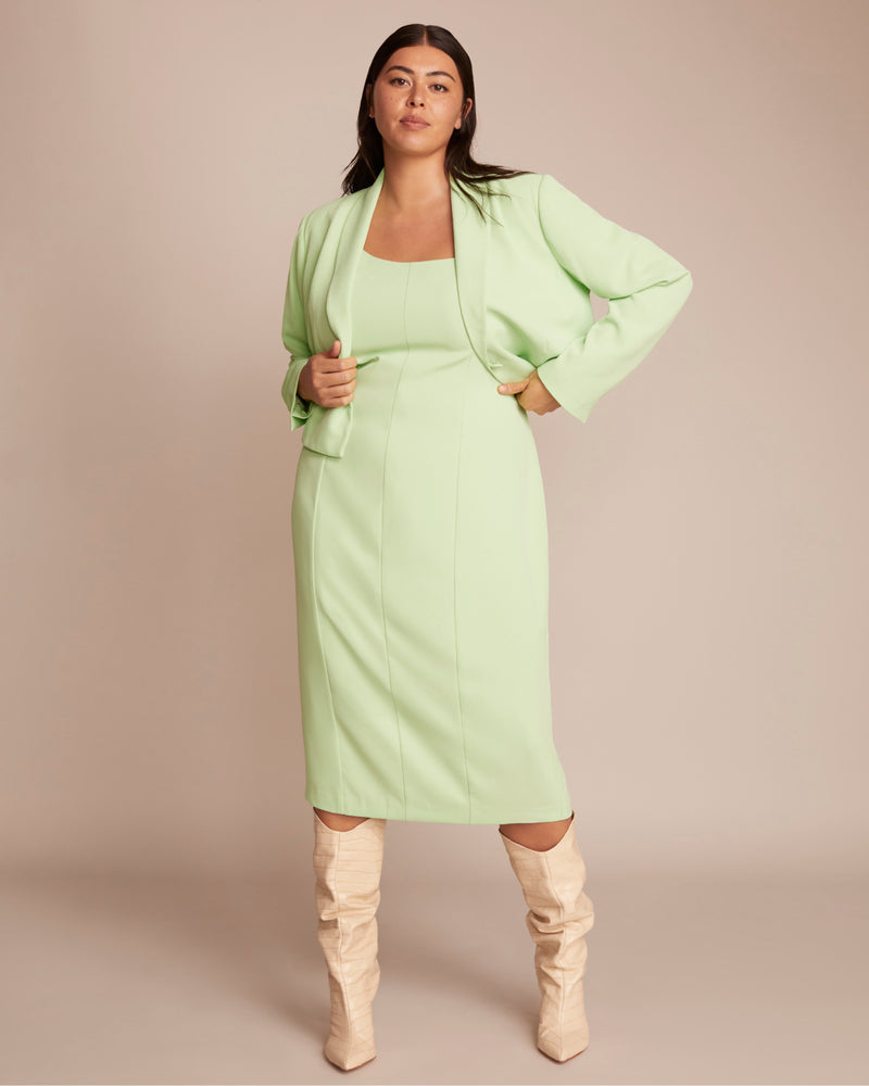 plus size woman in workwear outfit