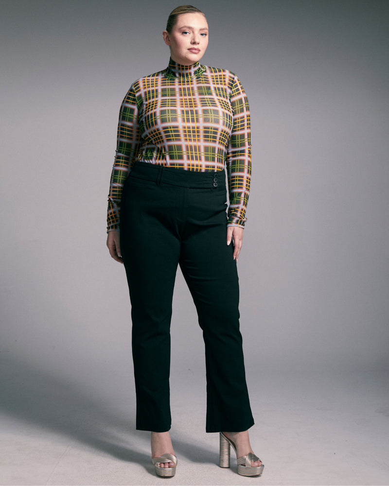 plus size woman in workwear outfit