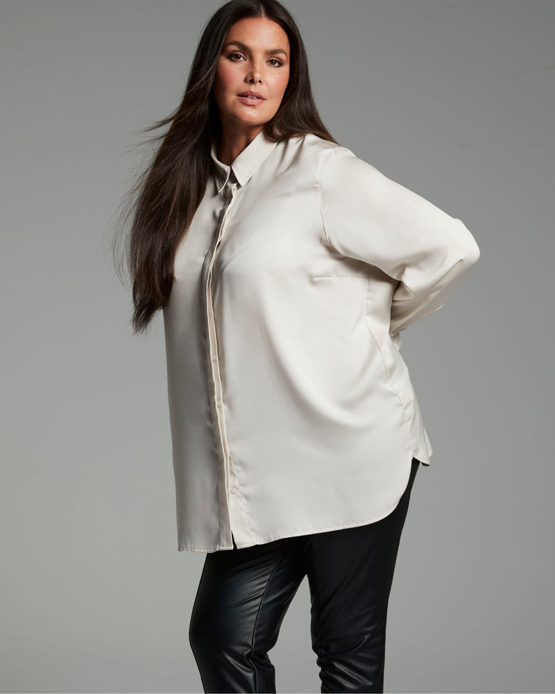 plus size woman in workwear outfit